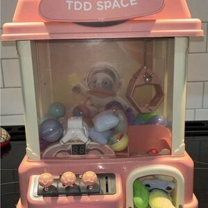 Pink and Cream Claw Machine Toy